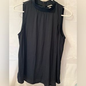 A new Day sleeveless blouse. Amazing under shirt for a blazer